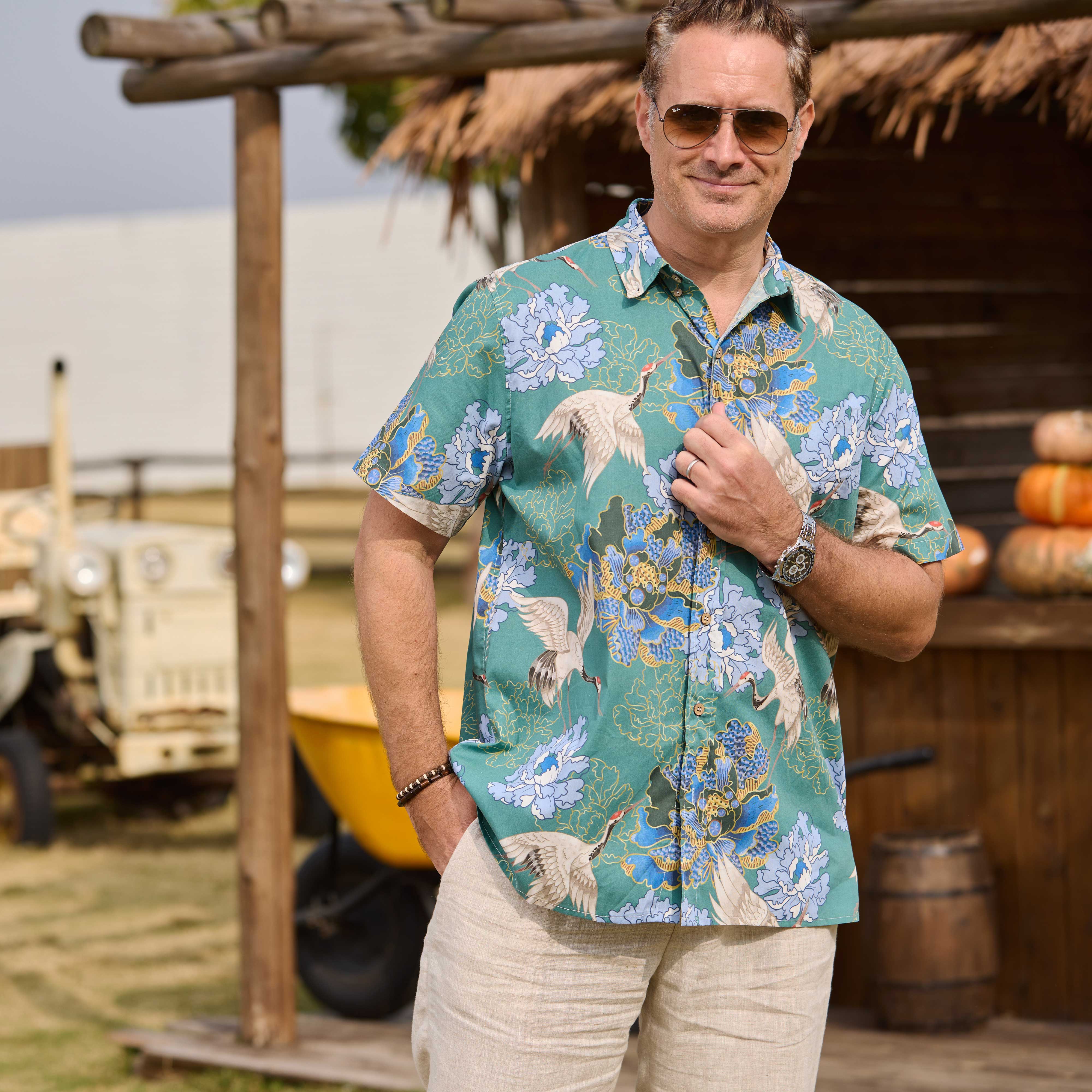 Crane Perched on Blue Peonies